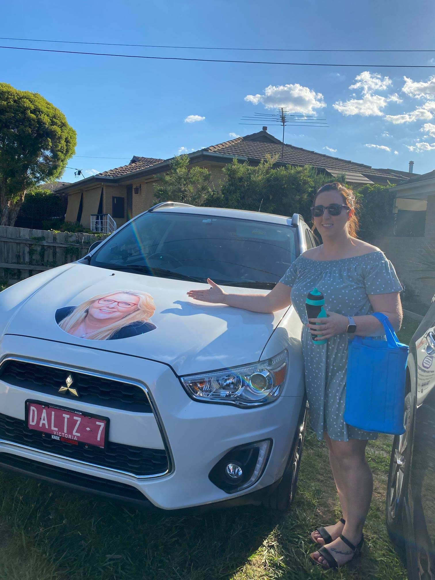 Kelly not so happy with Michelle putting her face all over her car!