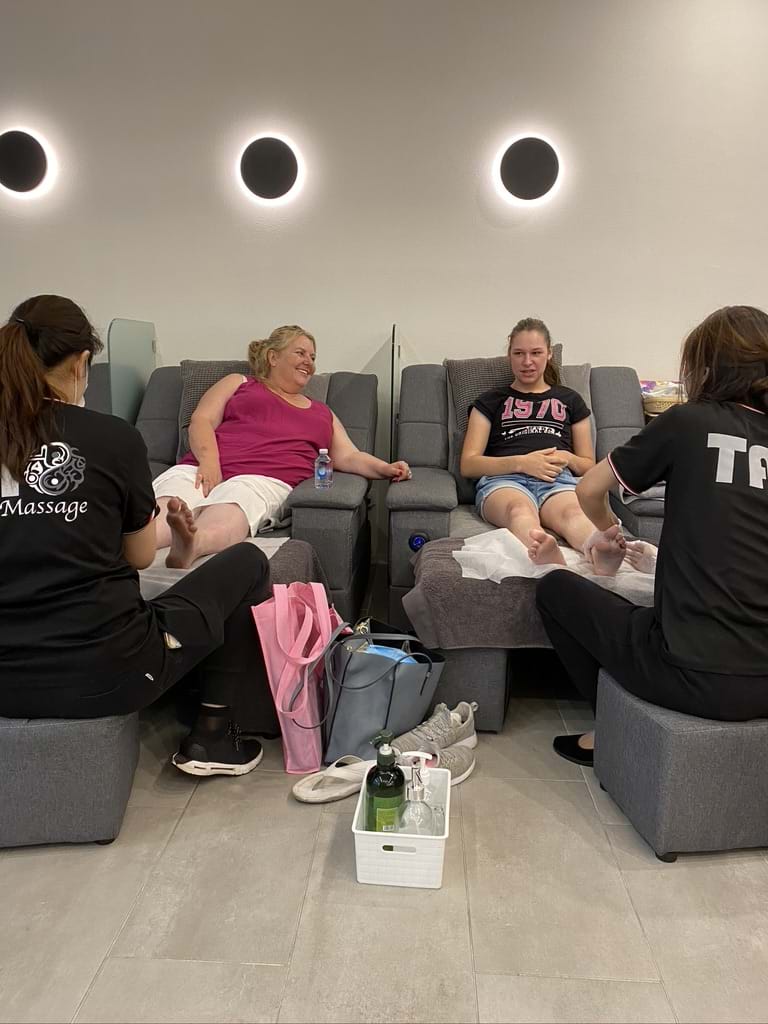 T getting her nails painted